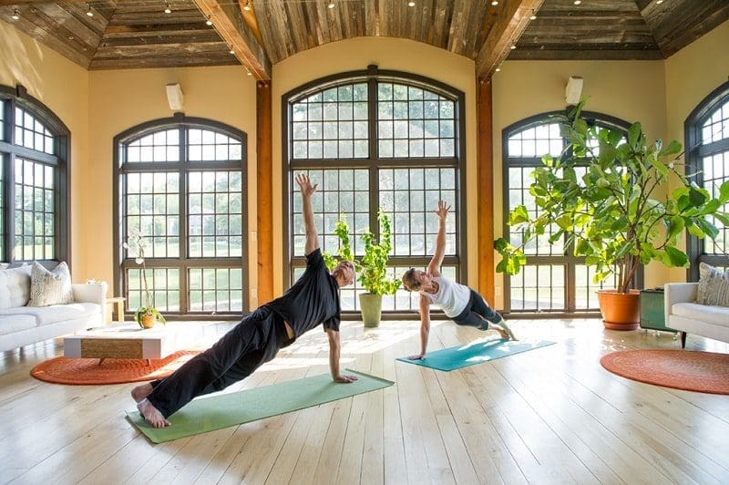 women doing fitness yoga at resort