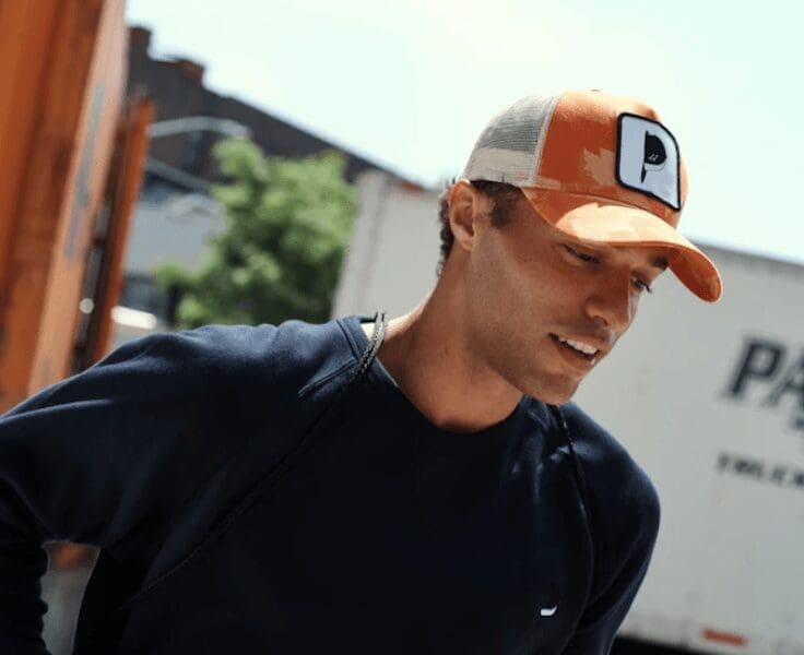 United States of camo orange trucker hat
