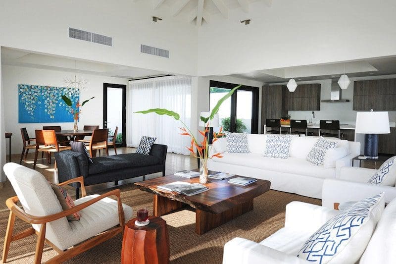 villa interior with white sofa and table