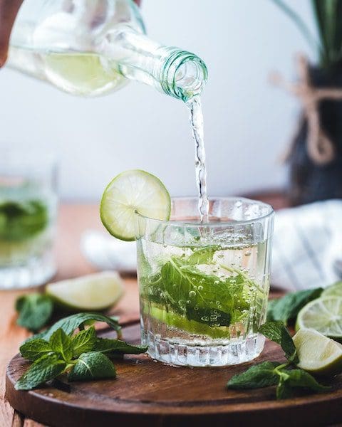 water glass with mint and cucumber refreshing healthy wellness detox