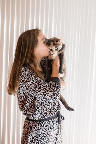 Vanessa Gordon in pajamas with cat Amy psychic animal connections