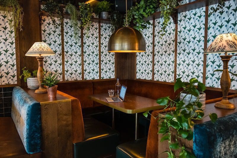 beautiful rustic restaurant interior garden greenery lamps