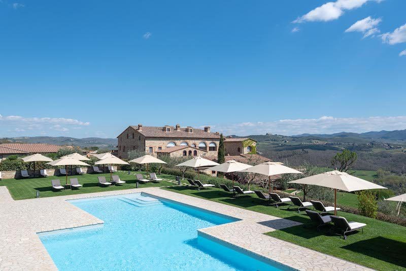 hotel le fontanelle outdoor pool with open umbrellas