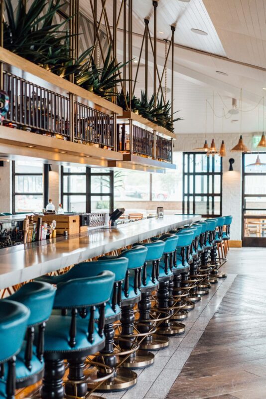 playa mesa restaurant interior chic elegant blue bar chairs