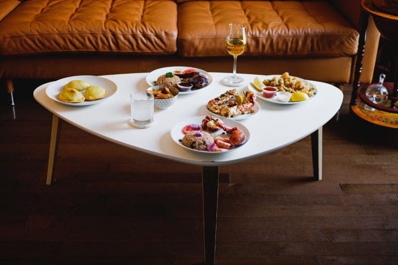 Jamaican food dishes on a table dinner