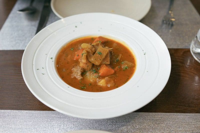 pepper pot soup white bowl