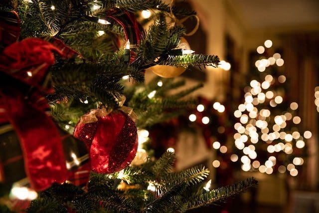 Christmas tree ornaments glistening lit