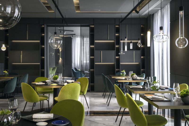 lunasia restaurant at hotel e de russie Italy green chairs