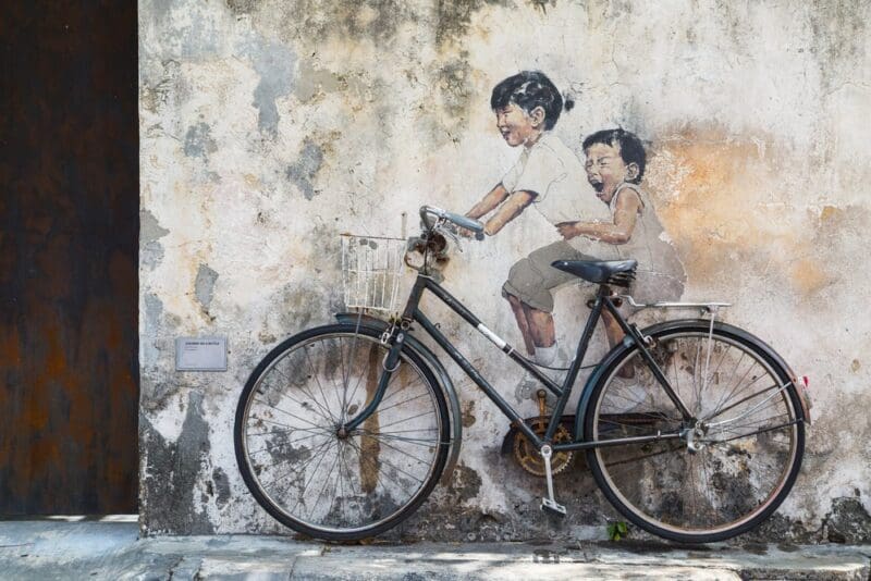 children street wall art on bike malaysia asia
