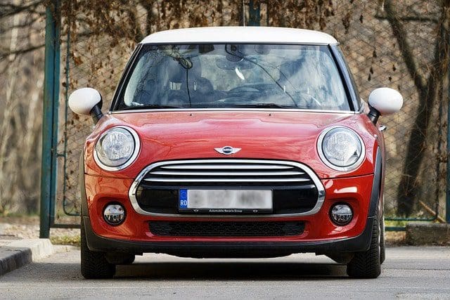red mini cooper on the road