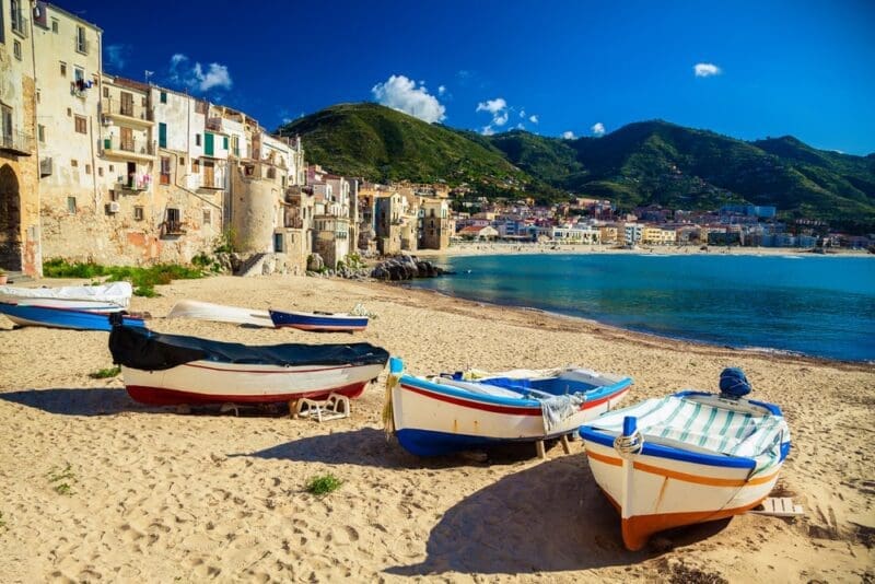 Old beach in Cefalu with fishing boats