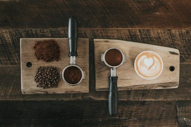 ground coffee on wooden table