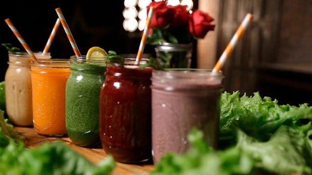 row of healthy smoothies and juice