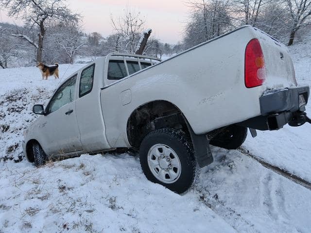 white truck accident in snow