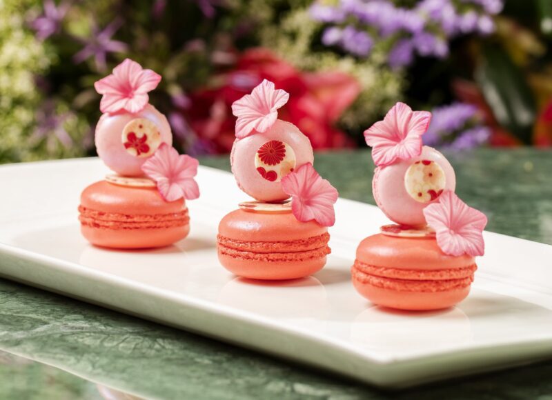 beautiful pink macarons with floral decorations details