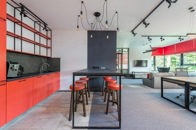 Contemporary kitchen interior with furniture and chandelier at home