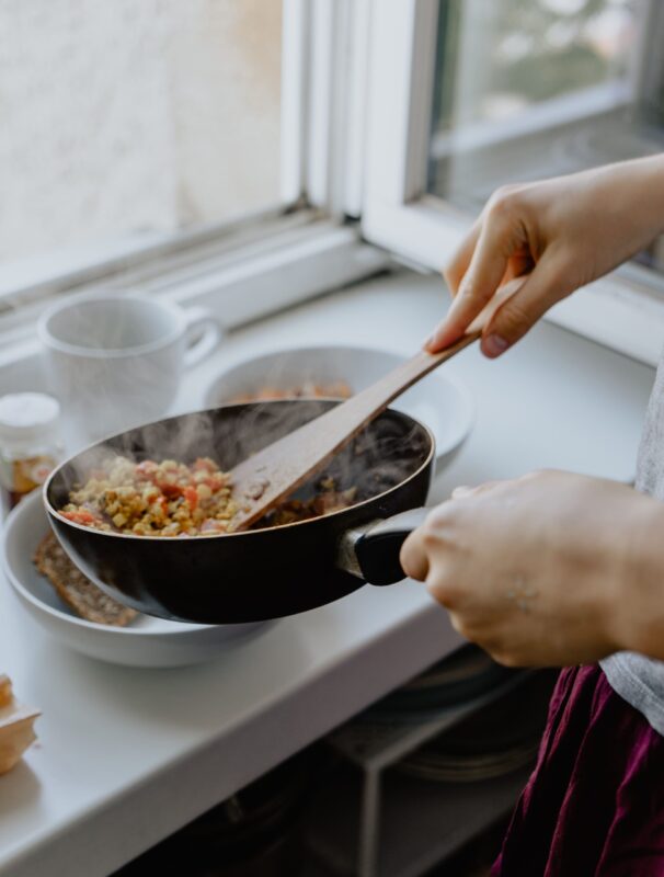 cooking vegetables with frying pan