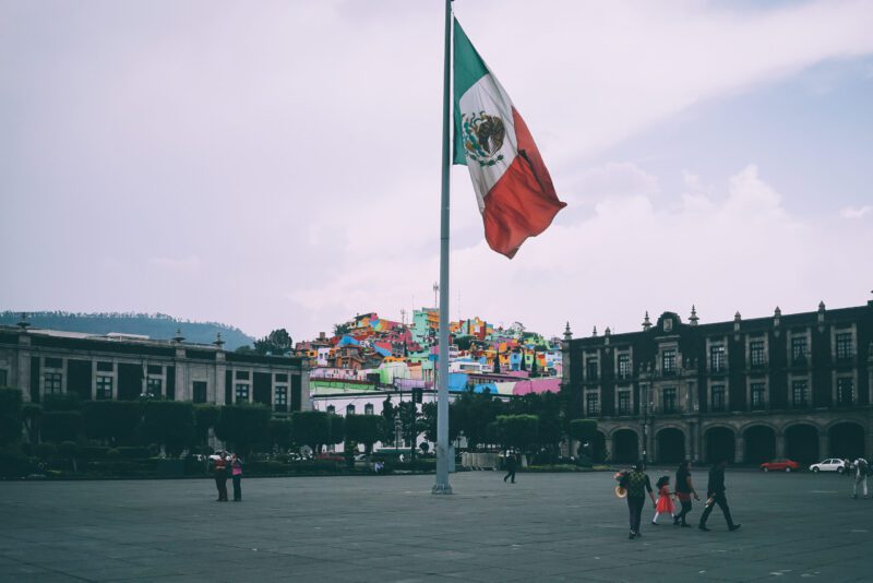 mexico flag in city center gray tone photo
