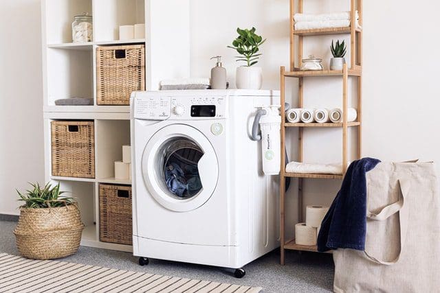 pwhite washing machine with beige decor