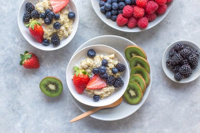 beautiful bowl of oatmeal with fresh fruit berries