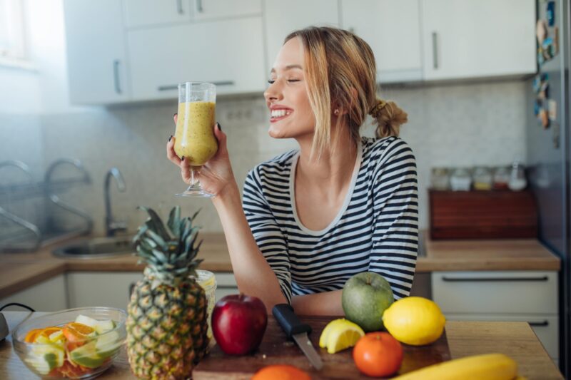 girl drinking a homemade juice smoothie