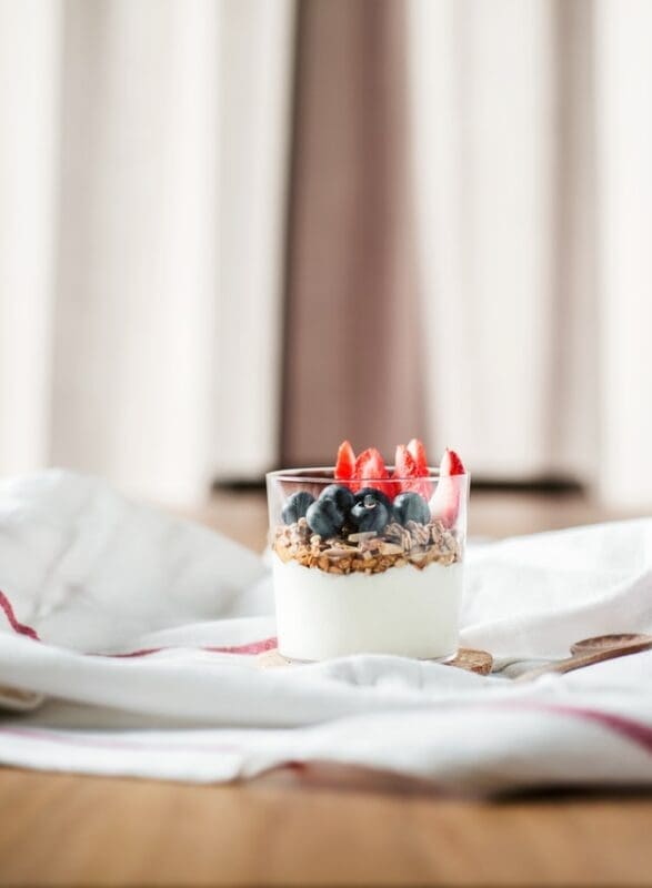 homemade yogurt fruit granola on table pretty