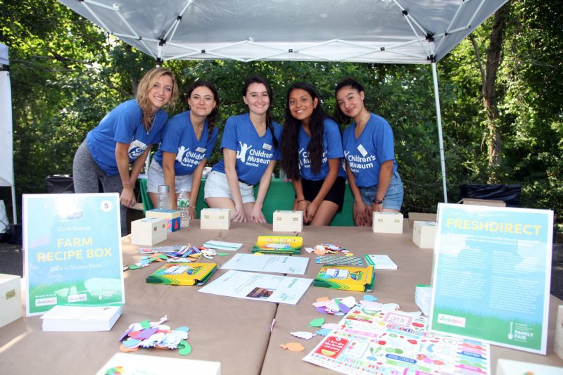 volunteers at Hamptons summer event CMEE blue shirts