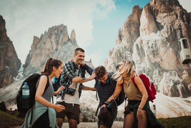 friends on mountain traveling together