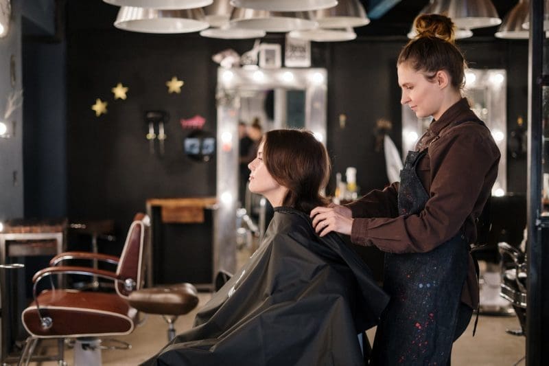 hair style at salon with black walls