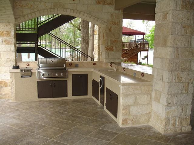 large outdoor stone kitchen