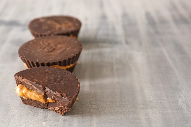 peanut butter cups on grey table