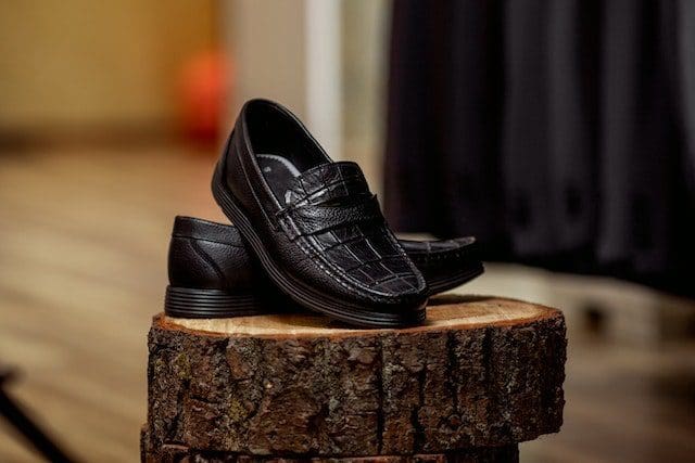 A Close-Up Shot of a Pair of Black Leather Loafers