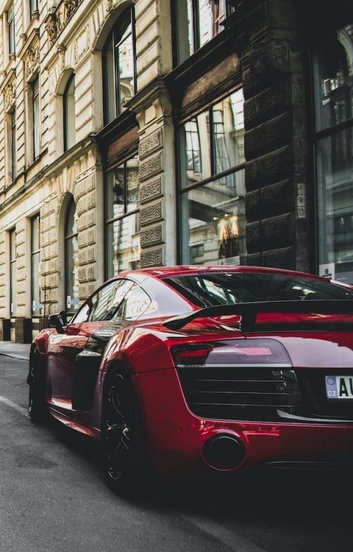 Red Luxury Vehicle on the Road