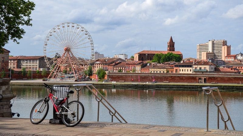 toulouse-france ferris wheel near river bank