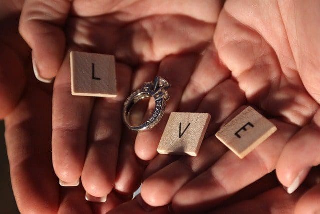 engagement ring with scrabble love letters