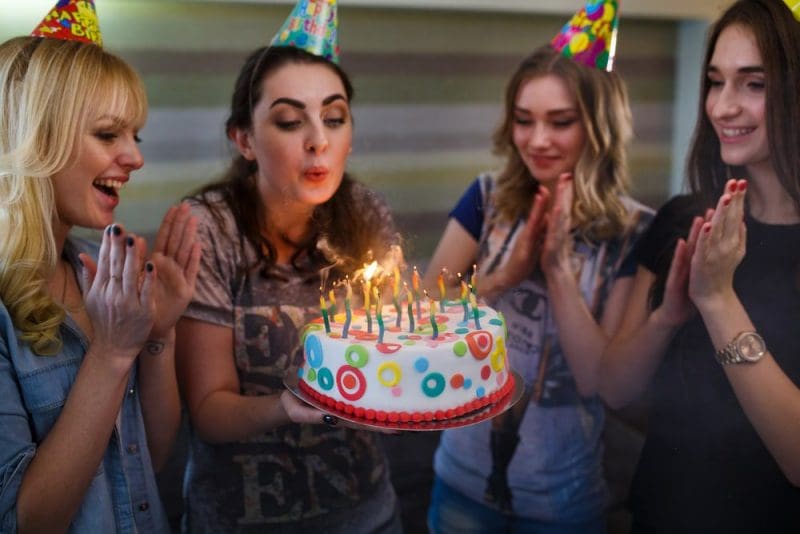 group of girls celebrating friend birthday