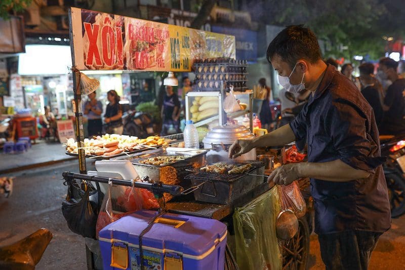 Hanoi street food vendor at night