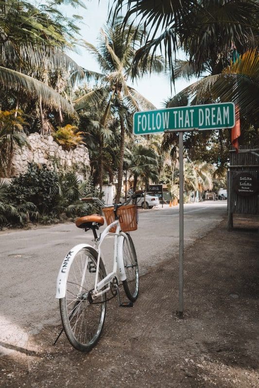 follow that dream sign tulum mexico bike