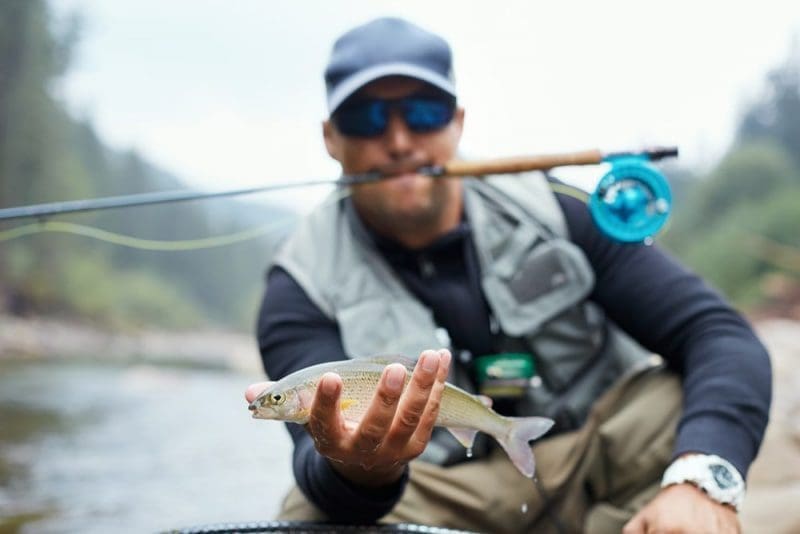 man fishing with polarized sunglasses