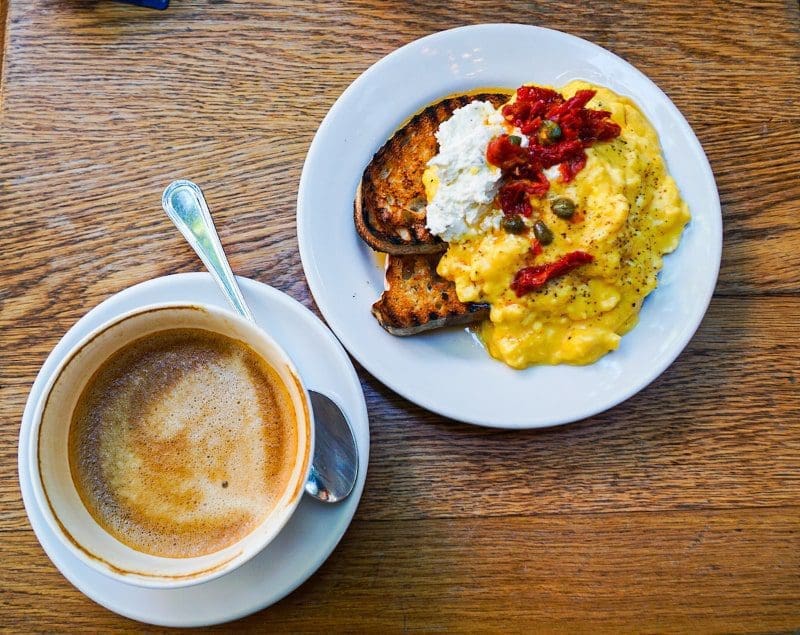 breakfast in nyc coffee eggs on table