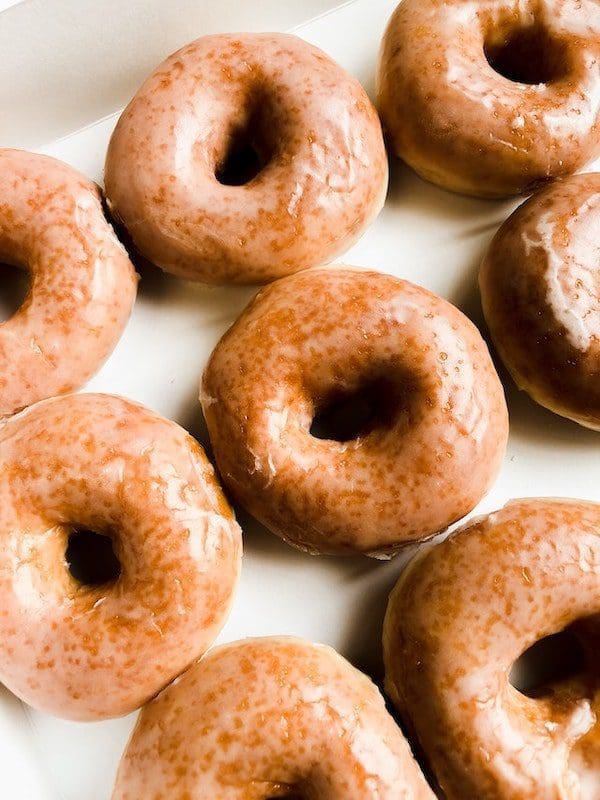 glazed doughnuts on tray