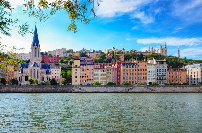 Lyon cityscape from Saone river with colorful houses and river