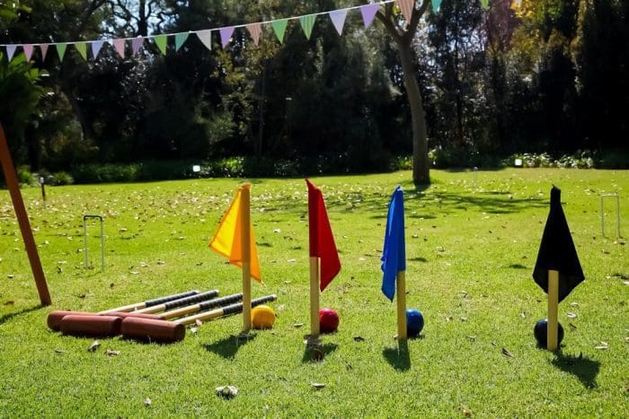 French Garden Croquet Set with flags on a grass lawn