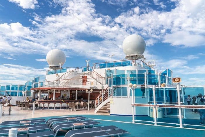 Top deck of Diamond Princess cruise ship with large LED TV
