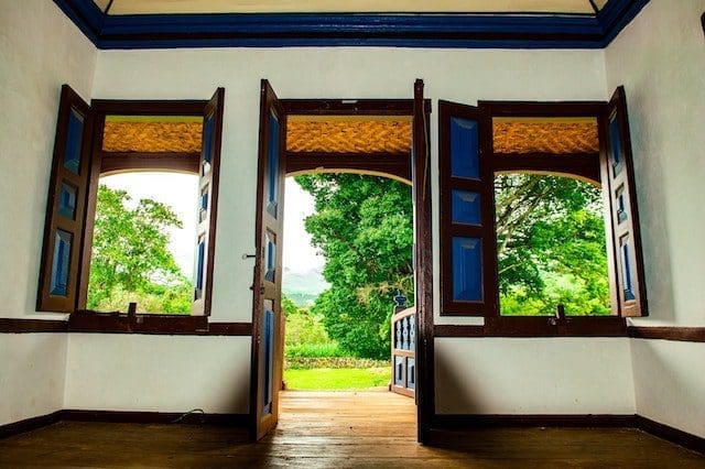 dark wood flower open windows house green grass