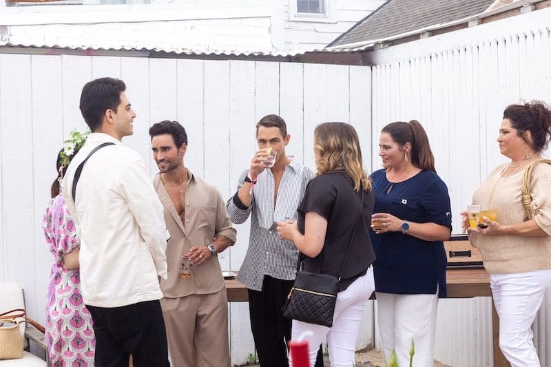 guests enjoying cocktail hour at The Surf Lodge