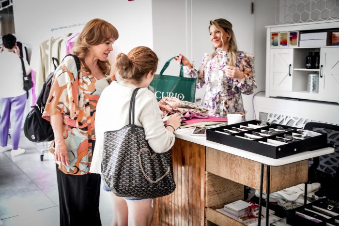 people shopping inside at pop-up fashion retail shop