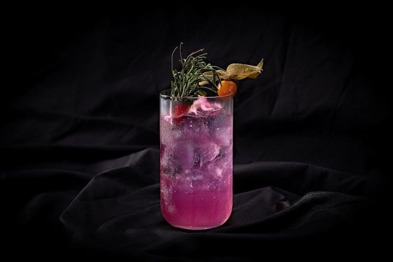 purple cocktail black background