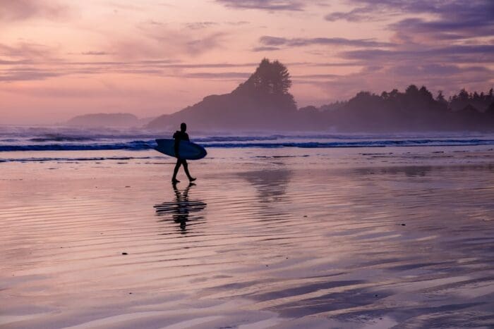 Tofino Vancouver Island Pacific rim coast, surfers with board