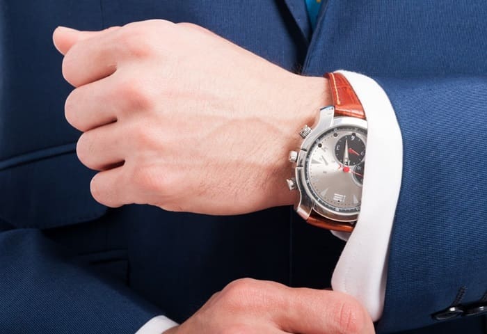 Elegant man's hands with expensive watch